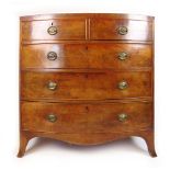 A late 18th century mahogany bow front chest of two short over three long drawers on splay feet, h.