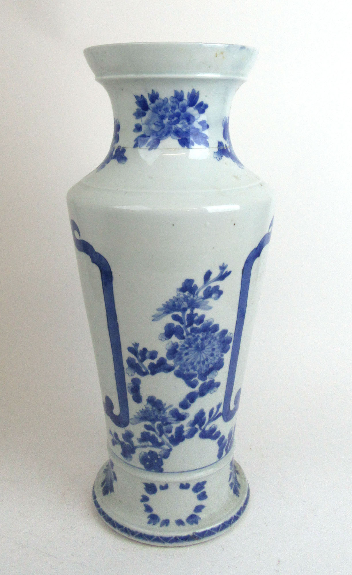 A large early 20th century Chinese blue and white porcelain vase having floral decoration and