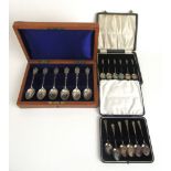 A cased set of London Rifle Brigade silver spoons together with a cased set of silver apostle