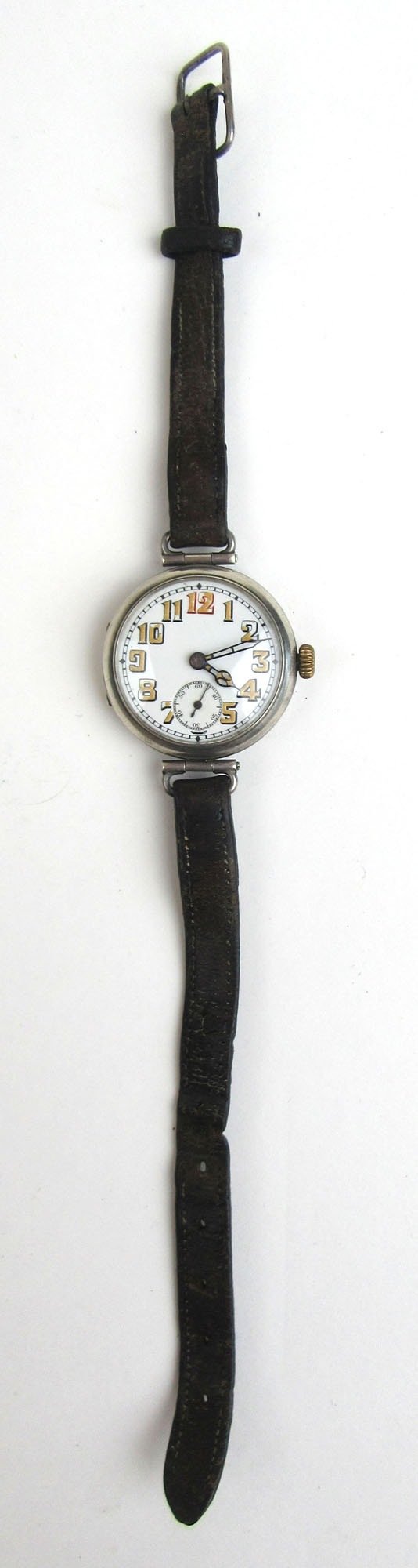 An early 20th century silver trench watch, the dial with luminous Arabic numerals and hands.