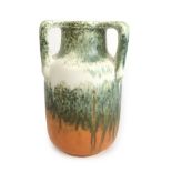 A Ruskin pottery Tyg decorated in a orange/green glaze, impressed 'Ruskin England 1933' to base h.