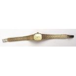 A ladies 9ct gold Marvin Revue wristwatch. Approx weight 21.