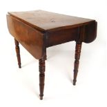 A 19th century elm drop leaf table, the top over turned legs, h. 70 cm, max w. 86 cm, d.