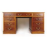 A 19th century mahogany twin pedestal desk,