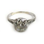 An early 20th century white metal and old mine cut diamond solitaire engagement ring,