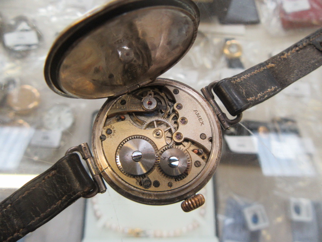 An early 20th century silver trench watch, the dial with luminous Arabic numerals and hands. - Bild 3 aus 3