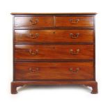 An 18th century mahogany chest of two short over three long drawers on bracket feet, h. 90 cm, w.