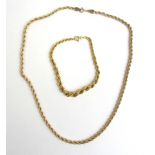 A 9ct gold rope twist necklace together with a 9ct gold rope twist bracelet. Approx weight 9.