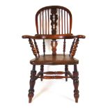 A 19th century elm Windsor chair,