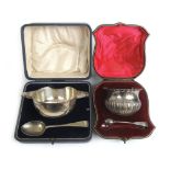 A George V silver porringer and spoon in presentation case together with a Victorian silver sugar