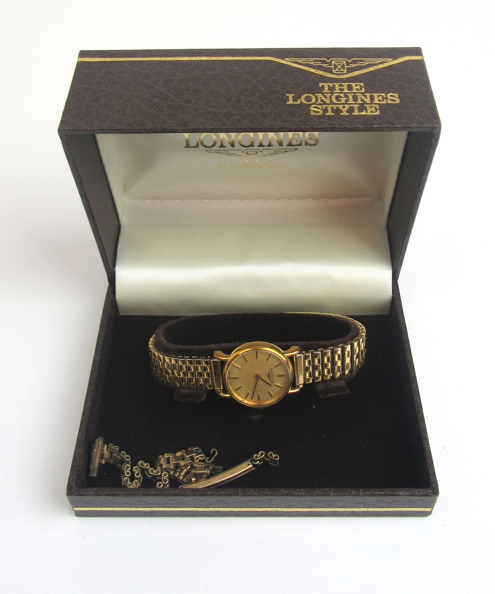 A ladies gold plated Longines manual winding wristwatch with box and papers