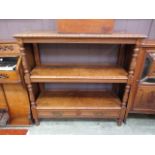 A Victorian walnut three tier buffet table with two drawers to base