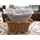 A selection of five wicker baskets