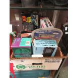 A box of assorted electrical items to include a portable television, radios games etc.