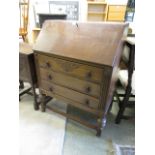 A mid-20th century oak fall front bureau