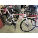 A white and red Extreme touring bike