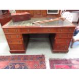 A late Victorian mahogany twin pedestal desk