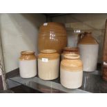 A quantity of earthen ware storage vessels