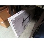 A boxed large fixed flat panel television mount