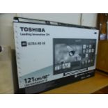 A boxed Toshiba 48'' T.V.