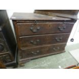 A mid 18th century oak chest of three long drawers (for restoration, 2.5 feet missing)