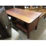 A mahogany table with under tier