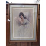 A framed and glazed print of young lady by Sturgeon signed in pencil