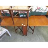 A mid-20th century teak drop-leaf table