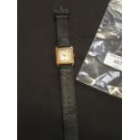 A men's 9ct gold cased wristwatch