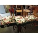 Three trays of floral fabric curtains