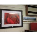 A framed and glazed print of a red rose and a framed and glazed photographic print of Atlanta,