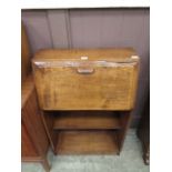 A mid-20th century oak bachelor's bureau