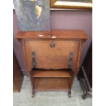 An early 20th century oak fall front bureau