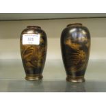 A pair of late 19th century Japanese vases decorated with natural scenes (A/F)