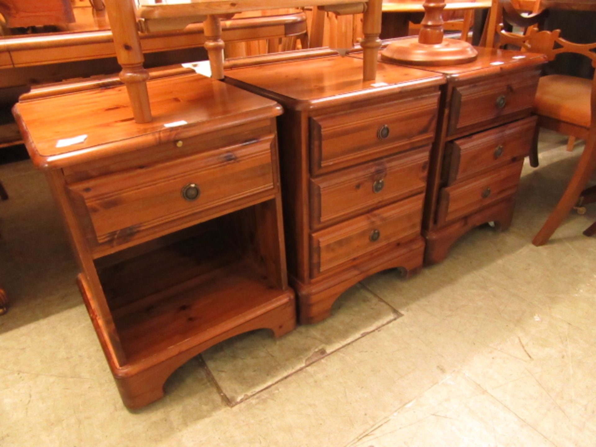 Three pine bedside cabinets