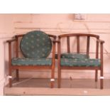 A pair of early 20th century beech framed open armchairs