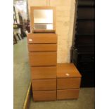 A modern oak veneered chest of six drawers with mirror to top along with a matching bedside chest