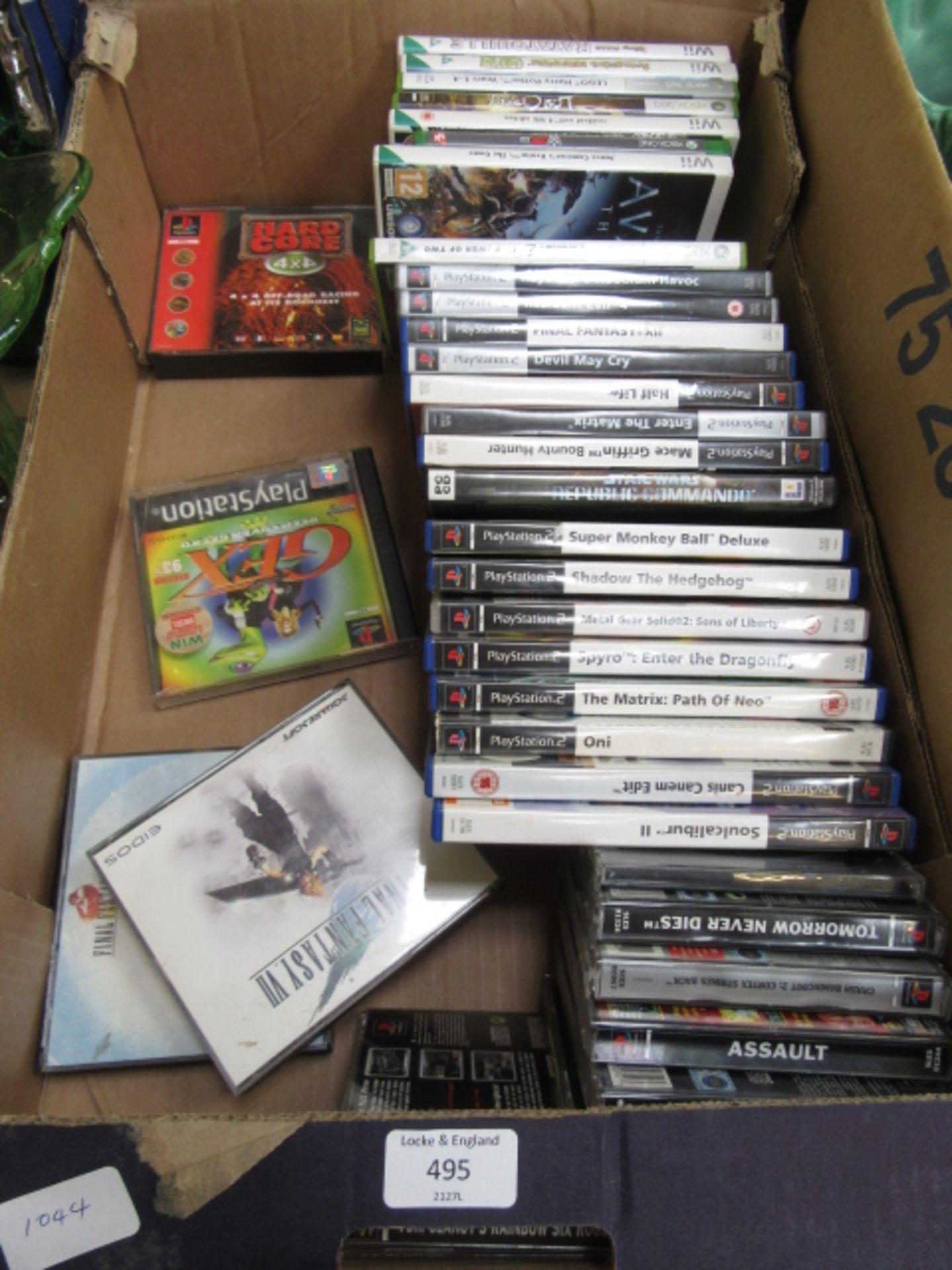 A tray containing a quantity of Playstation Two games, Wii games etc.