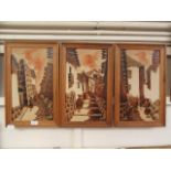 A set of three framed oil on boards of African scenes