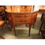 A reproduction mahogany demi lune sideboard,