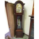 A modern mahogany cased granddaughter clock