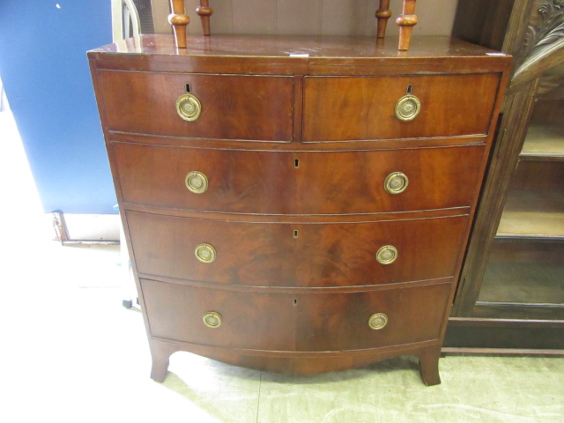 A 19th century mahogany bow front chest of two short over three long drawers