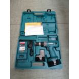 A Makita 6236 cordless drill