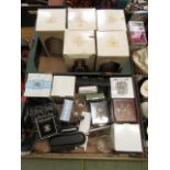 Two trays containing boxed new items to include pewter ware, ceramic whiskey bells etc.