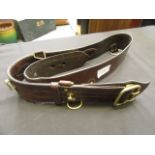 A brown leather military belt