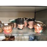 A collection of seven Royal Doulton Toby jugs