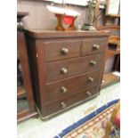 A nineteenth century oak chest of two short over three long drawers