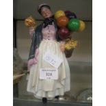 A Royal Doulton figurine 'Biddy Penny Farthing' HN1843