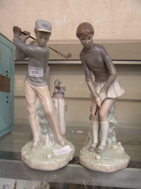 Two Lladro golfers,