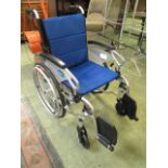 An almost new folding wheelchair